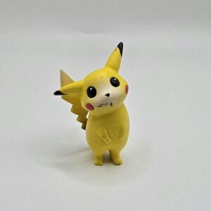 Vintage TOMY / CGTSJ Pokémon Pikachu 2-Inch Mini Figure (Inquisitive Head-Turn Stance)
