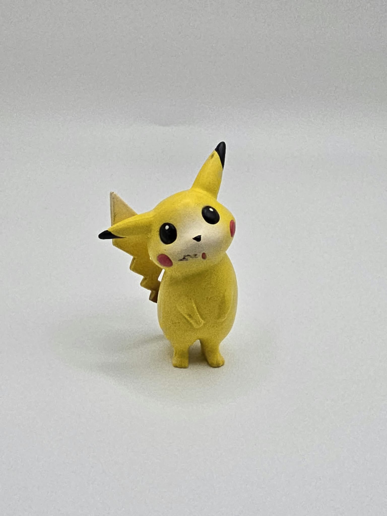 Vintage TOMY / CGTSJ Pokémon Pikachu 2-Inch Mini Figure (Inquisitive Head-Turn Stance)