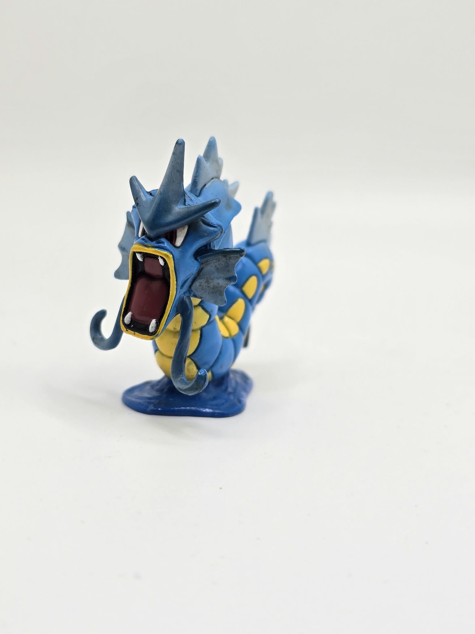Vintage TOMY Pokémon Gyarados 2-Inch Mini Figure with Water Base